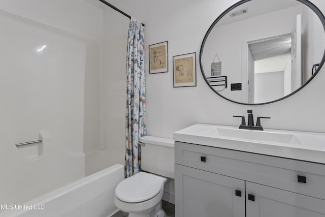 11222 Cypress Bayou Dr, Gulfport, MS 39503 - bathroom featuring shower / bath combo, visible vents, toilet, and vanity