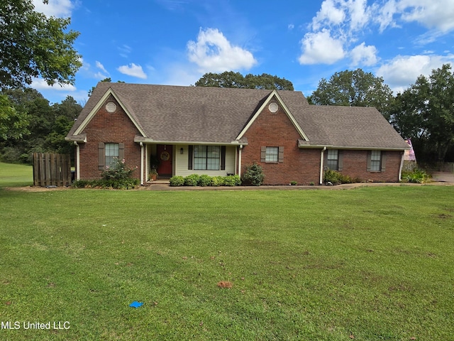 447 Shaker Dr, Senatobia, MS 38668 - single story home with roof with shingles, a front lawn, and brick siding