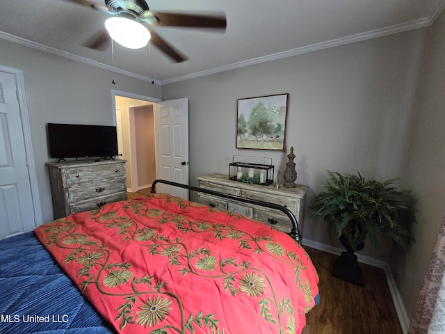 447 Shaker Dr, Senatobia, MS 38668 - bedroom featuring baseboards, dark wood-type flooring, a ceiling fan, and crown molding