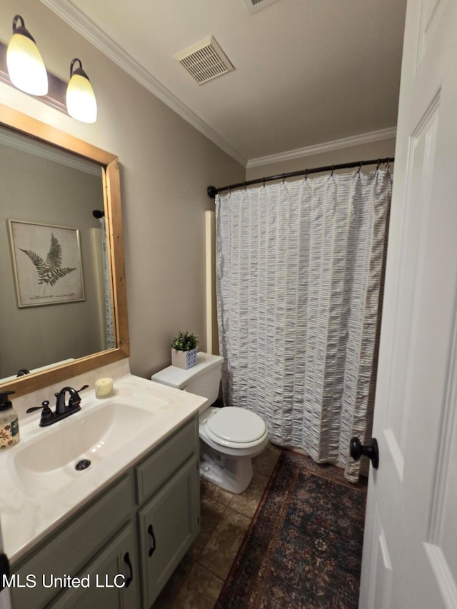 447 Shaker Dr, Senatobia, MS 38668 - bathroom with toilet, ornamental molding, vanity, and visible vents