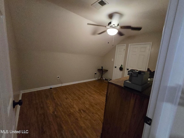 447 Shaker Dr, Senatobia, MS 38668 - bonus room featuring lofted ceiling, a ceiling fan, visible vents, baseboards, and dark wood finished floors