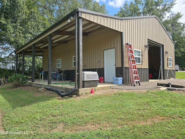 447 Shaker Dr, Senatobia, MS 38668 - view of pole building with a lawn