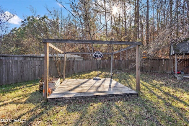 view of yard with a wooden deck