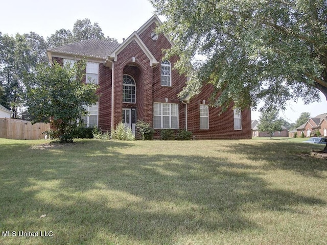 view of front of home with a front yard