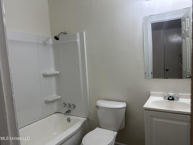 bathroom with shower / bathtub combination, toilet, and vanity