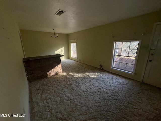 interior space featuring an inviting chandelier