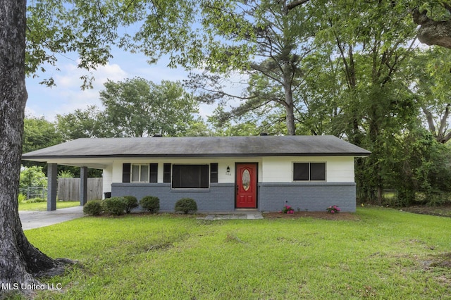 146 Greer Dr, Pearl, MS 39208 - ranch-style home with brick siding, driveway, an attached carport, and roof with shingles