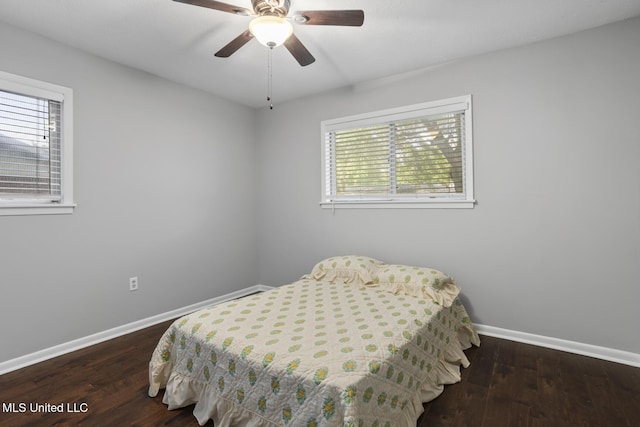146 Greer Dr, Pearl, MS 39208 - bedroom with multiple windows, baseboards, wood finished floors, and ceiling fan
