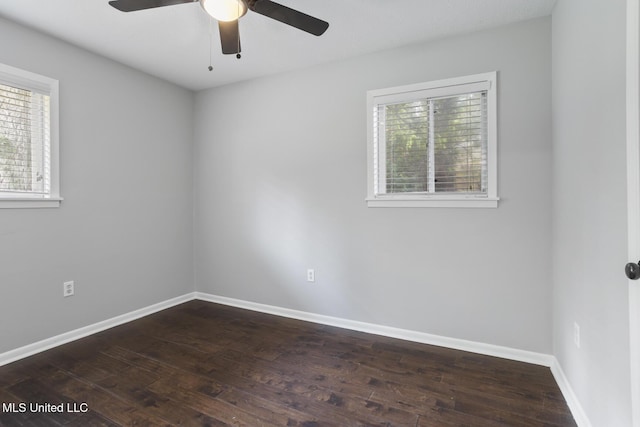 146 Greer Dr, Pearl, MS 39208 - empty room featuring dark wood-style floors, a ceiling fan, and baseboards