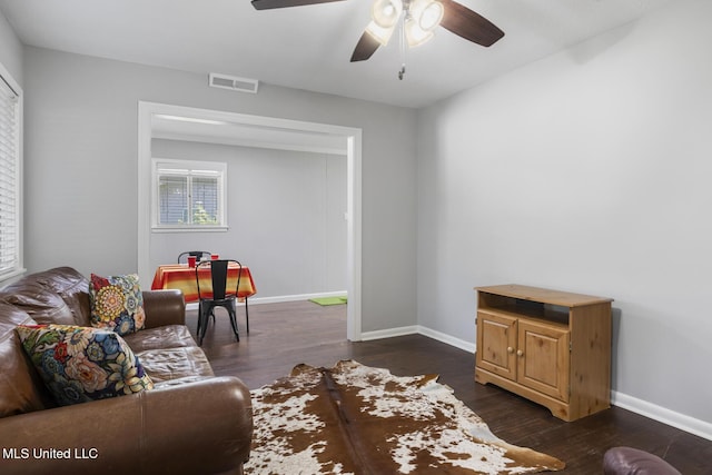 146 Greer Dr, Pearl, MS 39208 - living room featuring a ceiling fan, dark wood-style floors, and baseboards