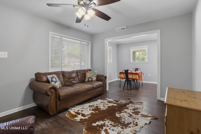146 Greer Dr, Pearl, MS 39208 - living area with a ceiling fan, baseboards, and dark wood-style floors