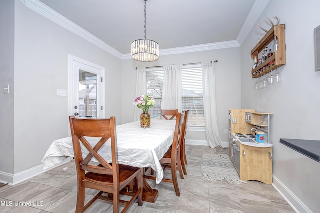 dining room with crown molding and an inviting chandelier