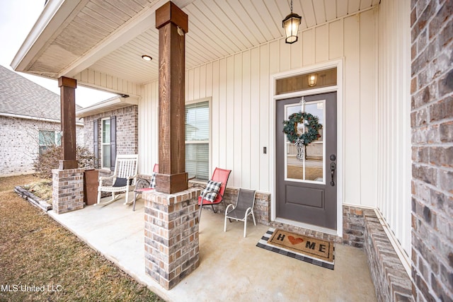 entrance to property with covered porch