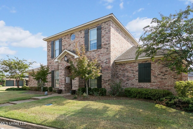 view of front of property featuring a front yard