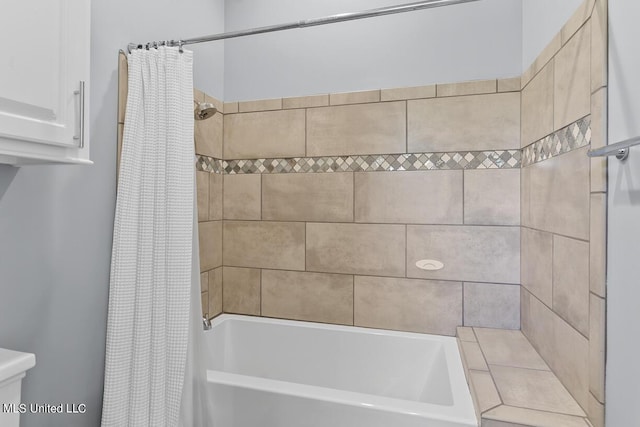 bathroom with shower / bath combination with curtain