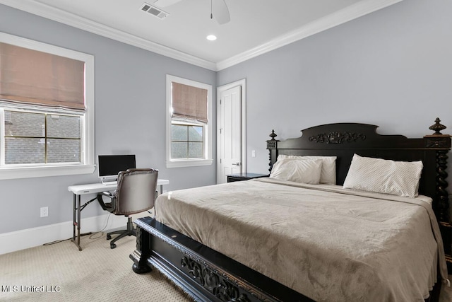 bedroom featuring ceiling fan, crown molding, and carpet flooring