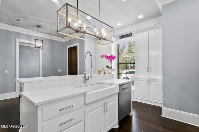 kitchen featuring dark hardwood / wood-style flooring, hanging light fixtures, light stone countertops, stainless steel dishwasher, and white cabinets