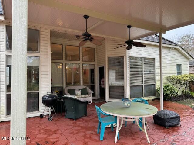 view of patio with ceiling fan and an outdoor hangout area