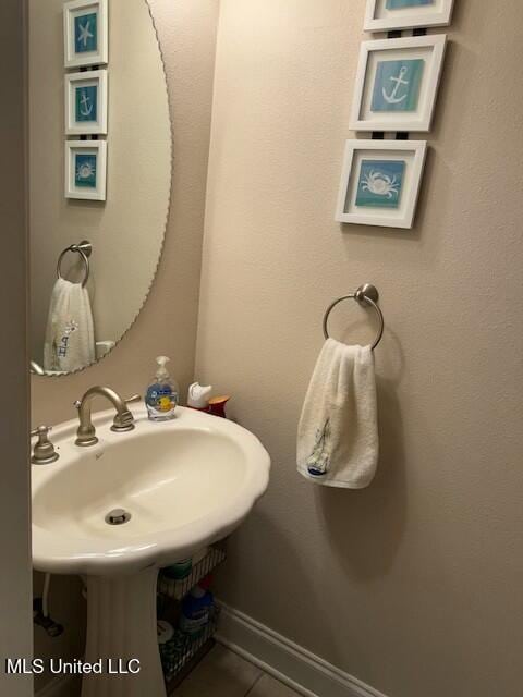 bathroom featuring tile patterned flooring