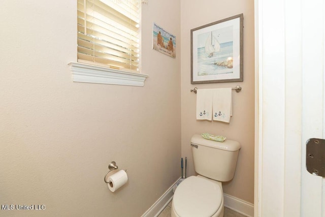 bathroom featuring toilet