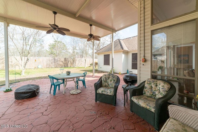 view of patio featuring ceiling fan