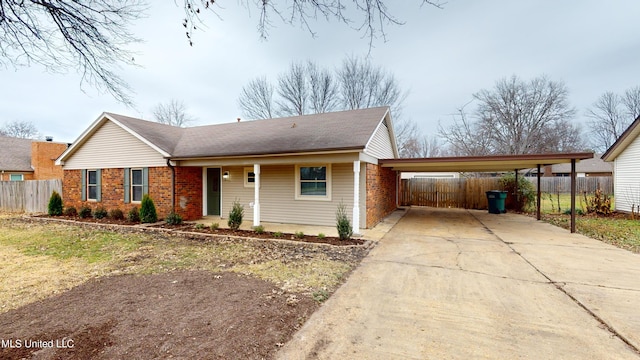 ranch-style home with a carport