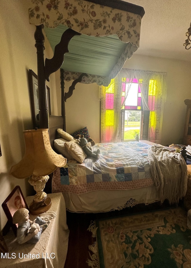 bedroom featuring a textured ceiling