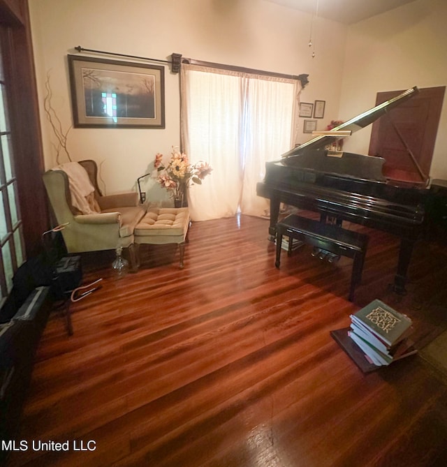 living area with dark hardwood / wood-style flooring