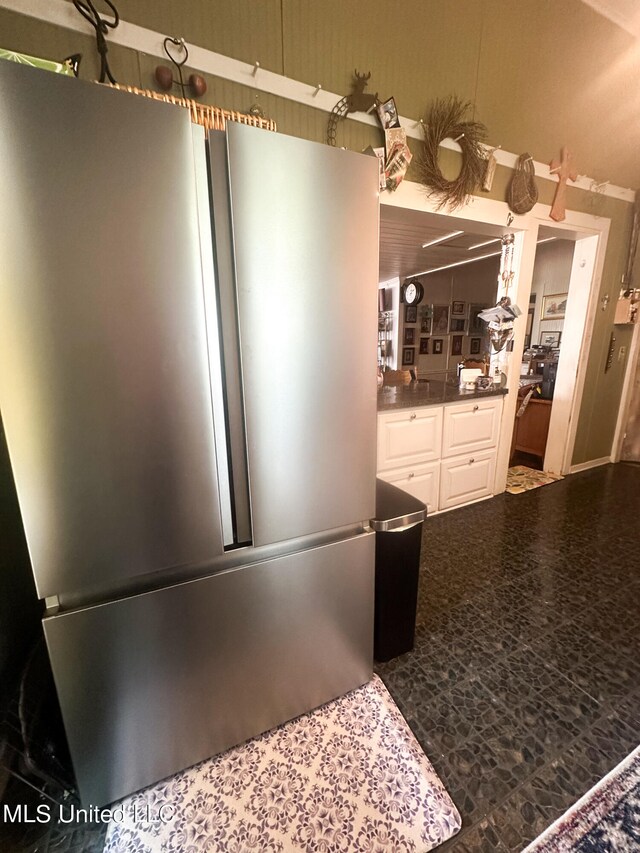 interior details featuring stainless steel fridge