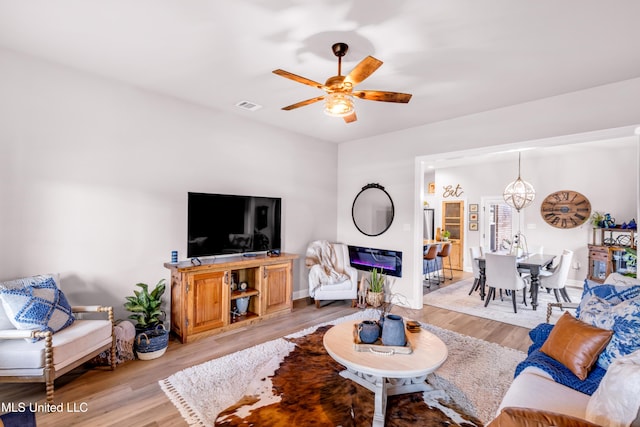 18109 Evergreen Dr, Gulfport, MS 39503 - living room featuring a ceiling fan and light wood-style floors