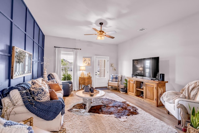 18109 Evergreen Dr, Gulfport, MS 39503 - living area featuring light wood-style flooring and a ceiling fan