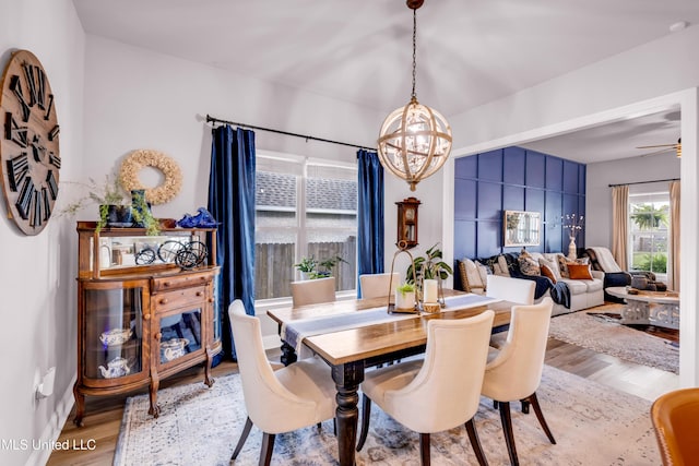 18109 Evergreen Dr, Gulfport, MS 39503 - dining area with wood finished floors and a chandelier