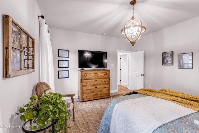 18109 Evergreen Dr, Gulfport, MS 39503 - bedroom with a chandelier and light colored carpet