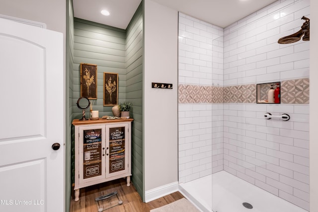 18109 Evergreen Dr, Gulfport, MS 39503 - full bath featuring wood finished floors, a tile shower, and recessed lighting