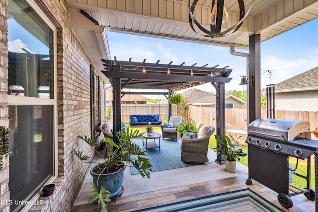 18109 Evergreen Dr, Gulfport, MS 39503 - fenced backyard with grilling area, outdoor lounge area, a pergola, and a patio area