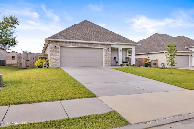 18109 Evergreen Dr, Gulfport, MS 39503 - view of front of property featuring roof with shingles, a garage, driveway, and brick siding