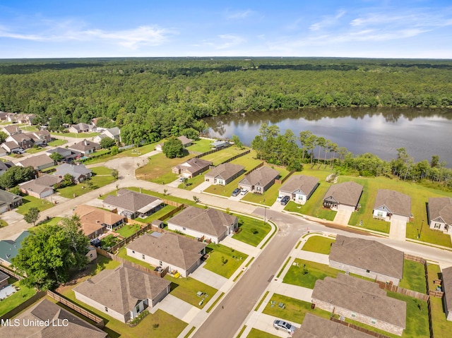 18109 Evergreen Dr, Gulfport, MS 39503 - aerial perspective of suburban area with a forest and a large body of water