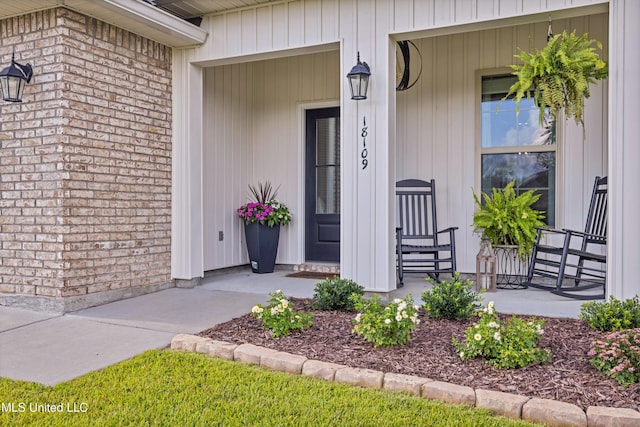 18109 Evergreen Dr, Gulfport, MS 39503 - property entrance with covered porch and brick siding