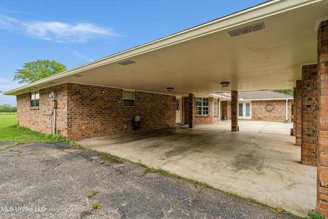 view of patio / terrace with a carport