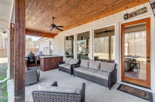 view of patio / terrace with grilling area and ceiling fan