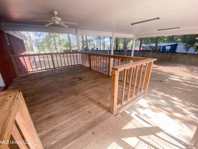 wooden deck with ceiling fan