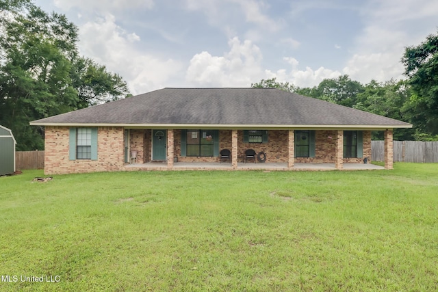 21783 Yankee Town Rd, Saucier, MS 39574 - view of front facade with roof with shingles, brick siding, and a porch