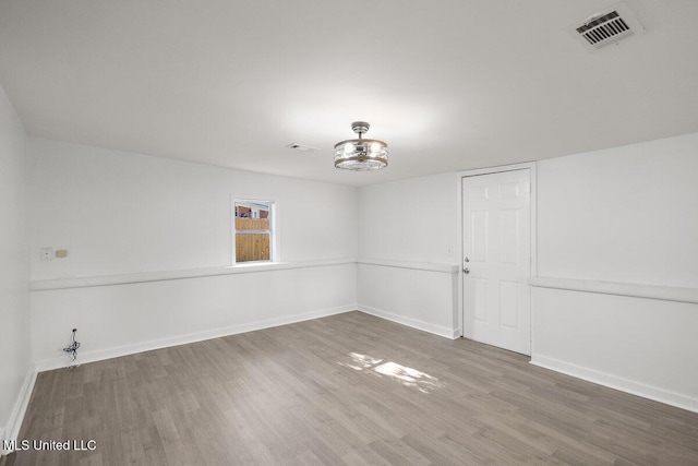 203 Bruin Ave, Pearl, MS 39208 - empty room featuring wood finished floors and baseboards