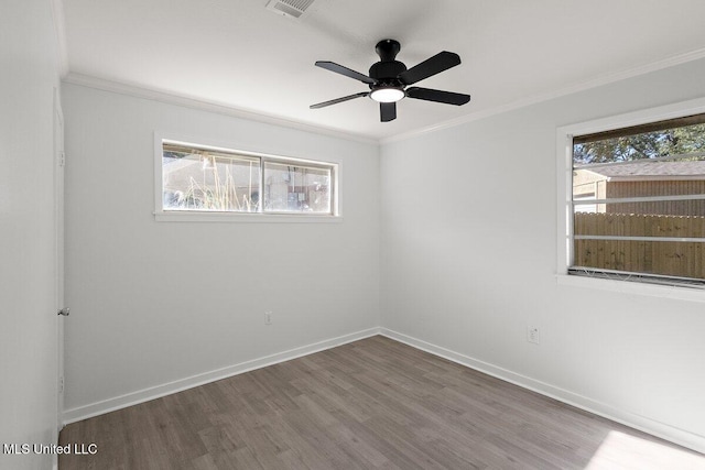 203 Bruin Ave, Pearl, MS 39208 - unfurnished room featuring ornamental molding, wood finished floors, plenty of natural light, baseboards, and ceiling fan