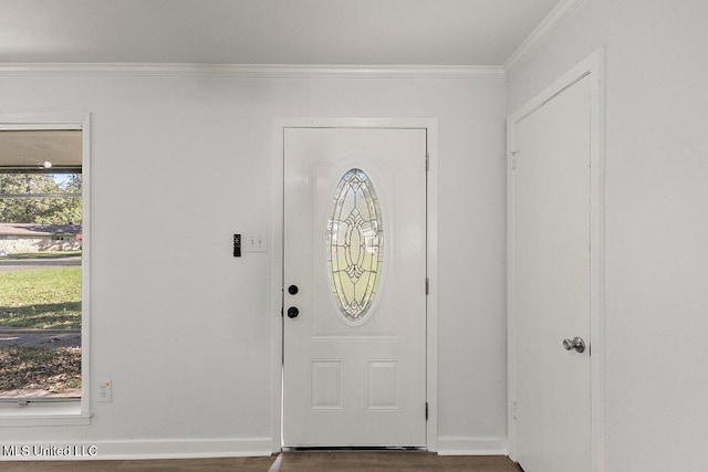 203 Bruin Ave, Pearl, MS 39208 - foyer entrance featuring ornamental molding, baseboards, and dark wood-style floors