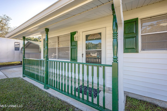 property entrance featuring covered porch