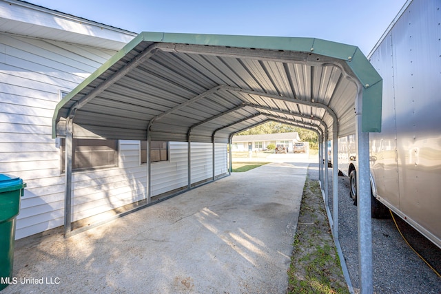 view of car parking featuring a carport