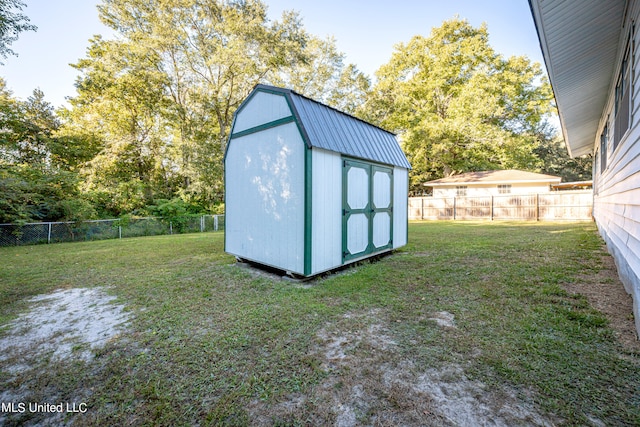 view of outdoor structure with a yard