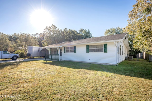 view of front of home with a front lawn