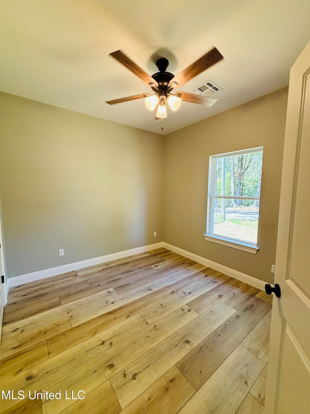 unfurnished room with ceiling fan and light hardwood / wood-style floors